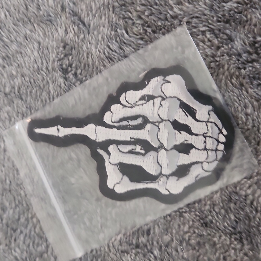 Skeleton middle finger iron on patch